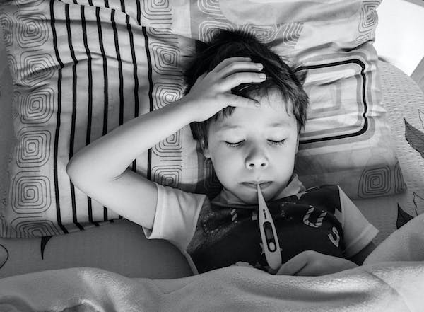 A kid down with flu